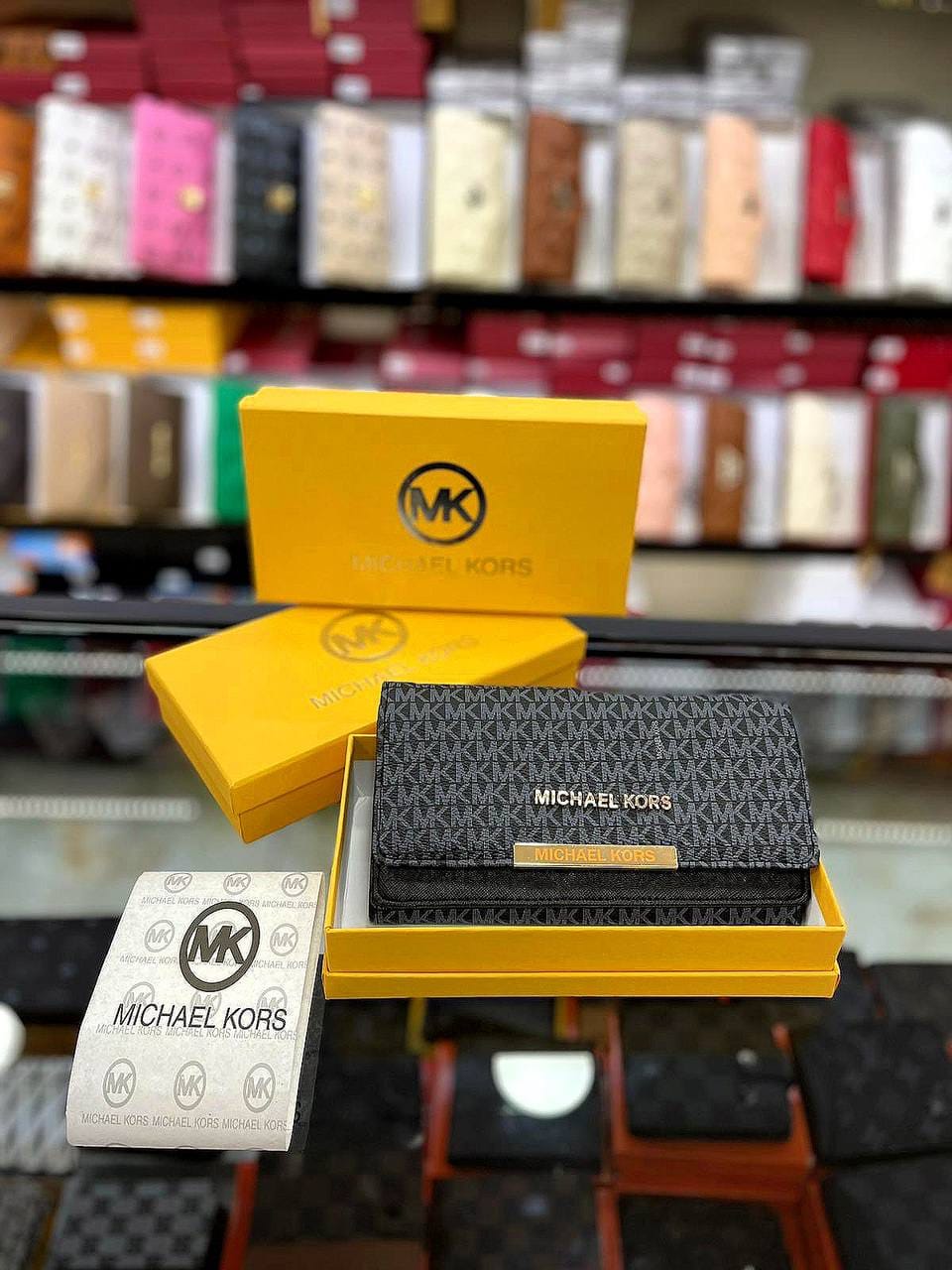 MK Bryant Large Signature Logo Snap-Front Wallet