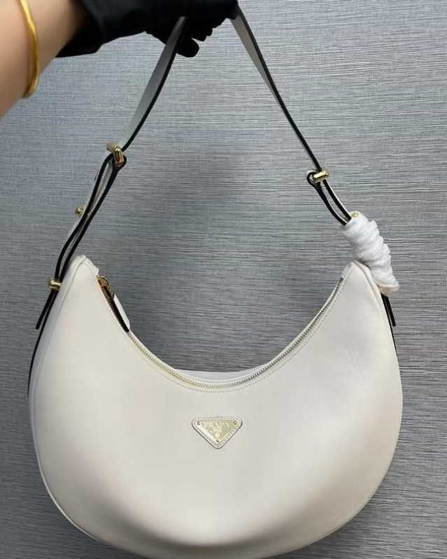 Prada UA Handbags