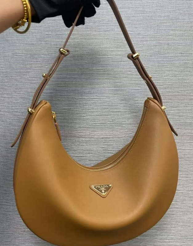 Prada UA Handbags