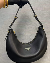 Prada UA Handbags