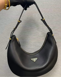 Prada UA Handbags