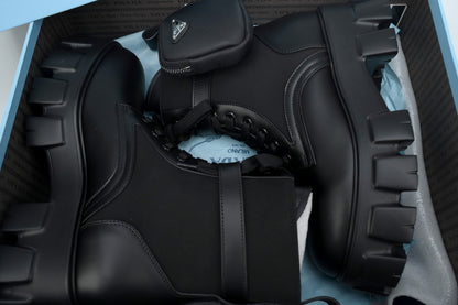 Prada Monolith leather and Re-Nylon boots with pouch