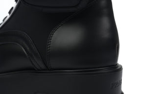 Prada Monolith leather and Re-Nylon boots with pouch